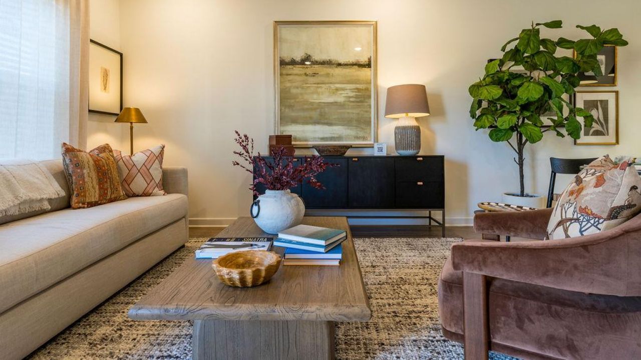 A living room with a couch and a coffee table.