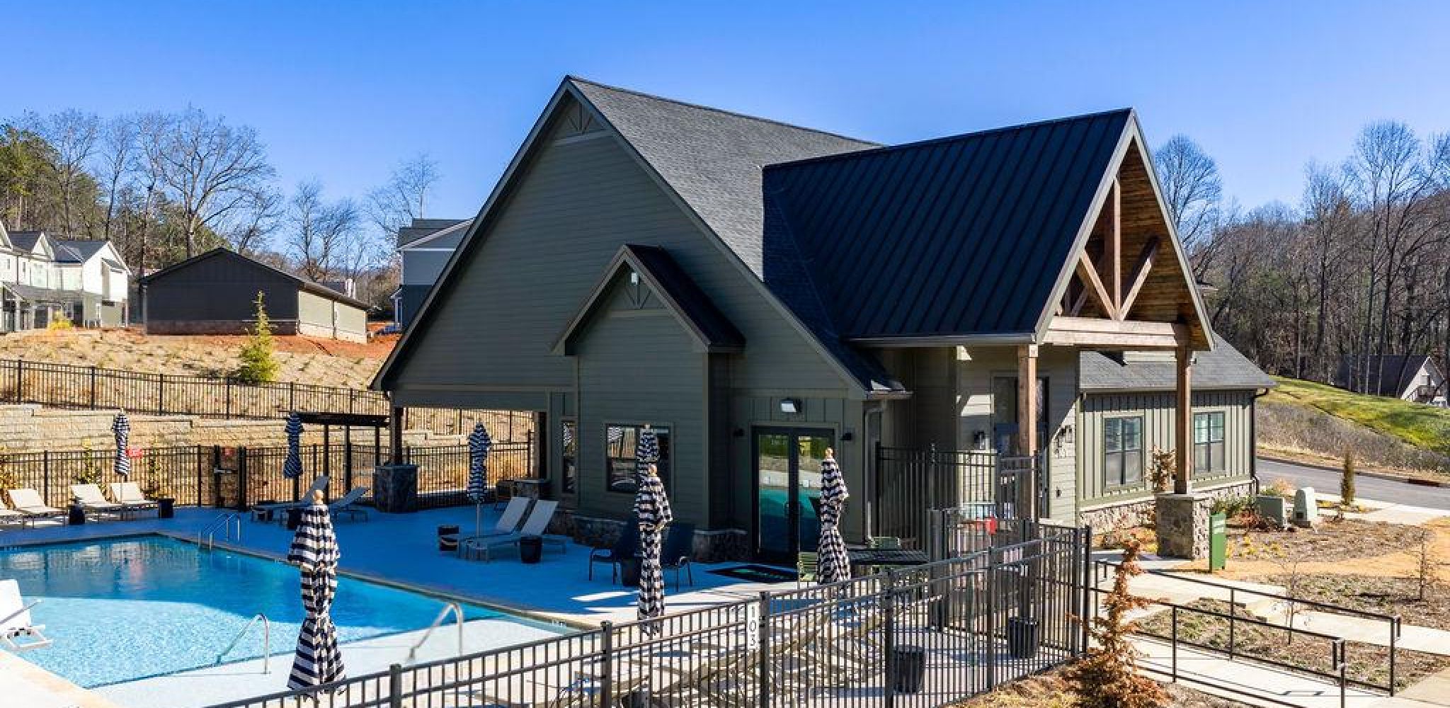 Encore at Reems Creek female diverse friends doing stretching exercise in the park - diverse friends warming up before doing group exercise