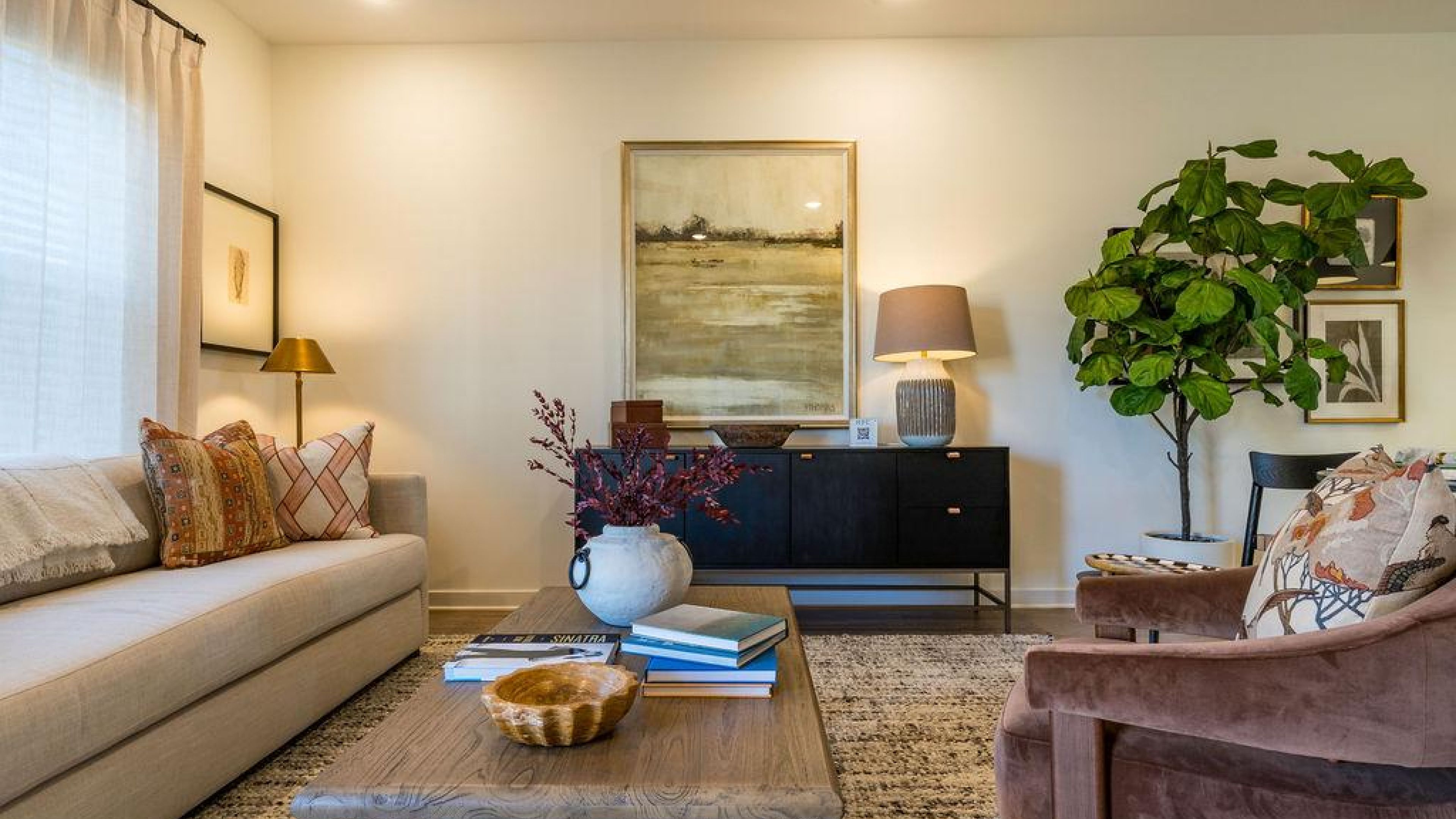 Encore at Reems Creek cute dog sitting on apartment living room floor